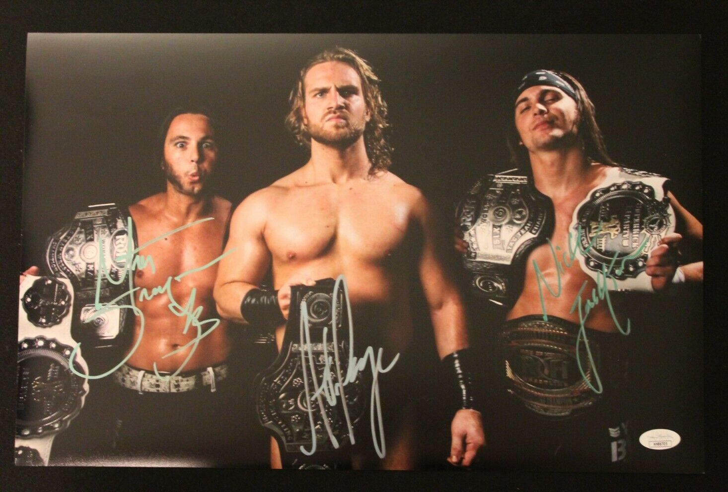AEW Autograph Adam Page and the Young Bucks JSA Certified 11x17